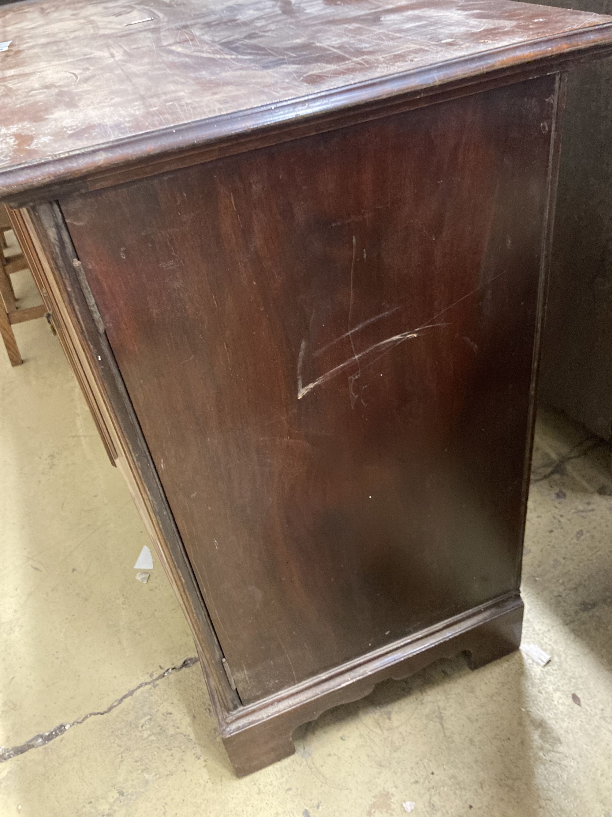 An Edwardian mahogany two door cabinet, length 122cm, depth 51cm, height 86cm